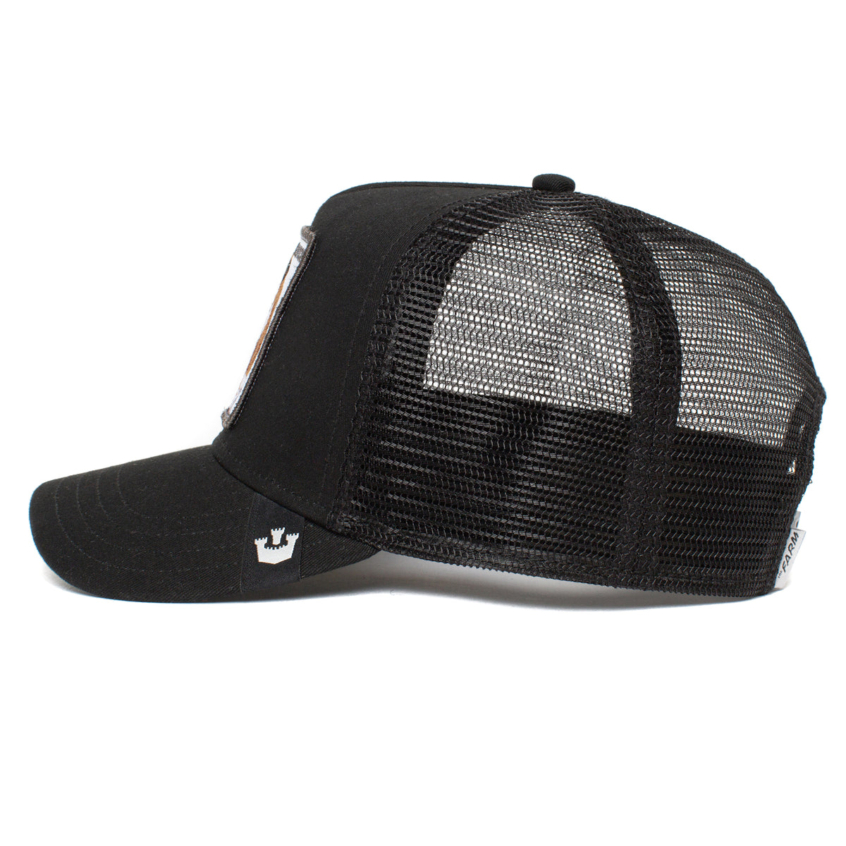 The Butch by The Farm: black mesh trucker hat shown from the side, with a curved brim and adjustable snapback closure. All sales final.