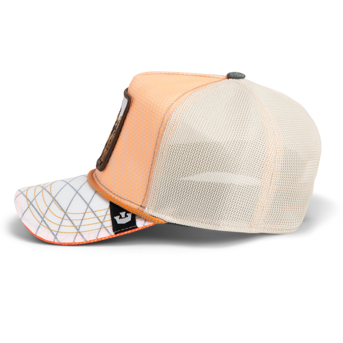 Orange and white mesh trucker hat by Goorin Bros., featuring a grid-stitched brim and a brown Tactical Yak patch logo on the front, shown in a side profile view. This Tactical Yak mesh hat offers added style with its patterned bill.