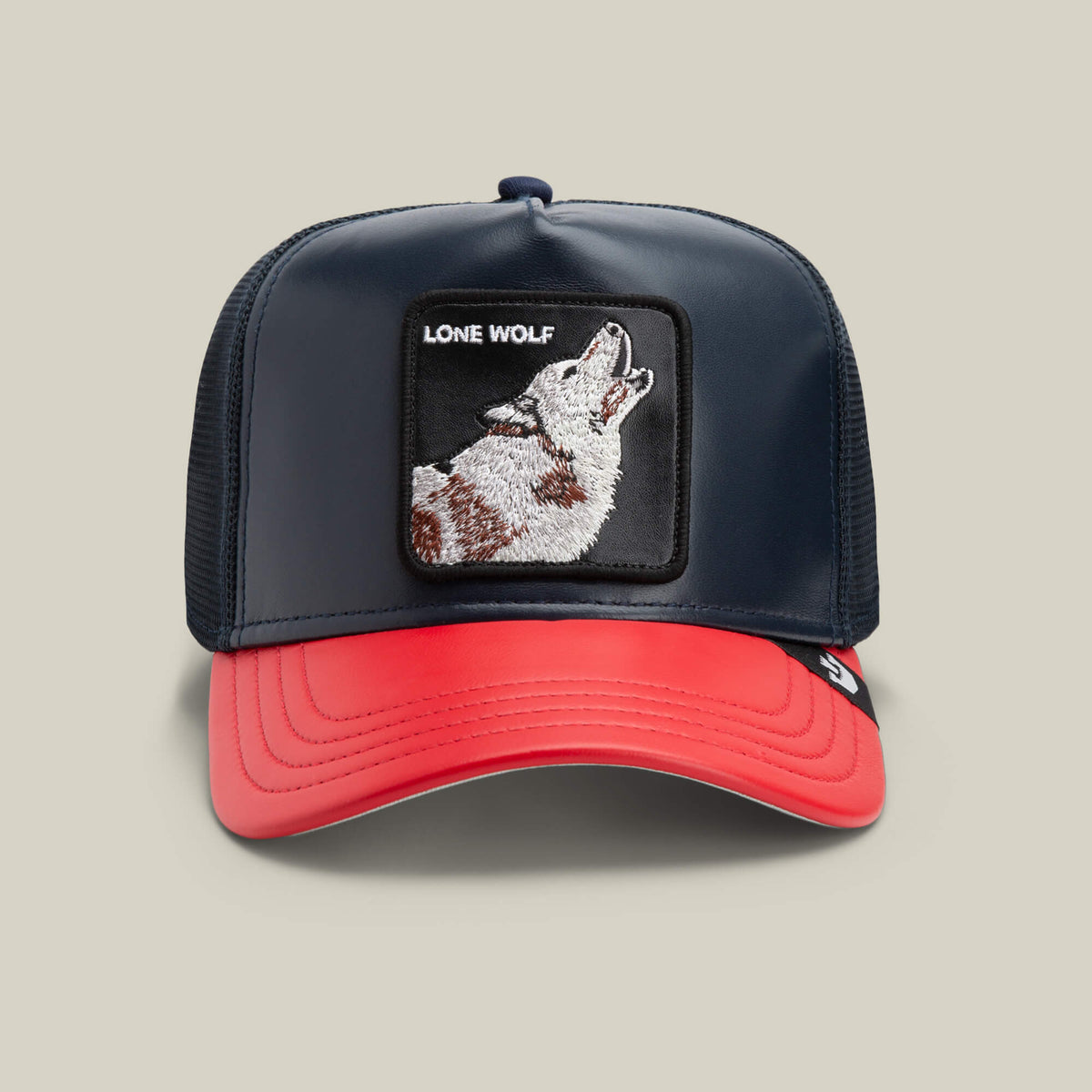 The Farm's Shleather Wolf hat features a red brim, black mesh, and a howling wolf patch with "LONE WOLF"—a bold accessory to elevate your trendy style.