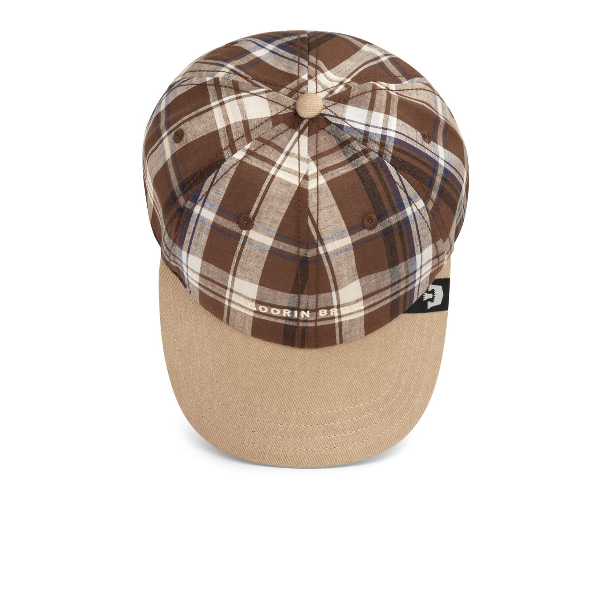 The Goorin Bros. “Ask Your Mother” cap features a brown and beige plaid pattern with a solid beige brim, shown from above on a white background.