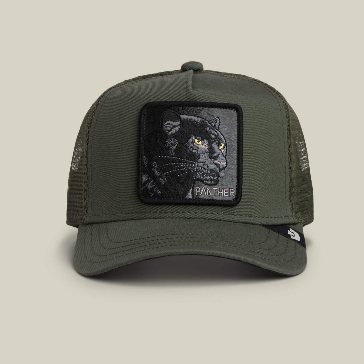 The Goorin Bros. Panther Trucker features a PALM-colored front and mesh back, plus a bold black panther patch with "PANTHER" on the front—a stylish choice for any look.