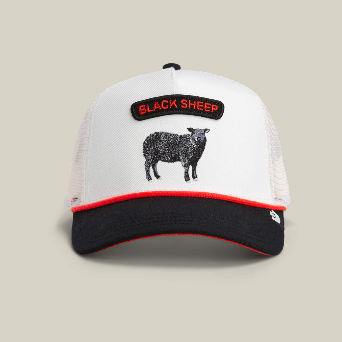 The Pop Rocker Sheep cap by Goorin Bros. is a white mesh trucker hat with a black bill, red trim, and an embroidered “BLACK SHEEP” patch above a sheep illustration.