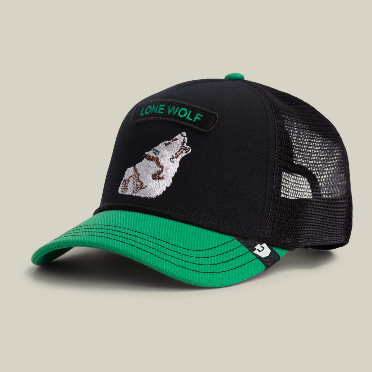 The Goorin Bros. Pop Rocker Wolf cap features a black and green mesh back, bold wolf embroidery, and LONE WOLF text on the front.