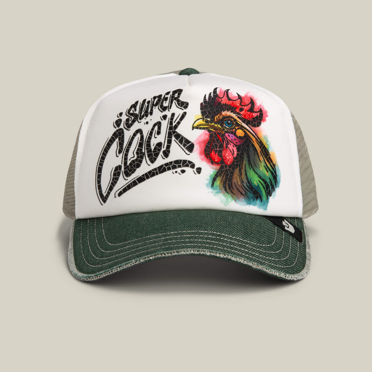 The Goorin Bros. Cock Disruption trucker cap in Scout features a hand-illustrated rooster head, a white front panel, and a green bill, highlighted with the bold “Super Cock” phrase.
