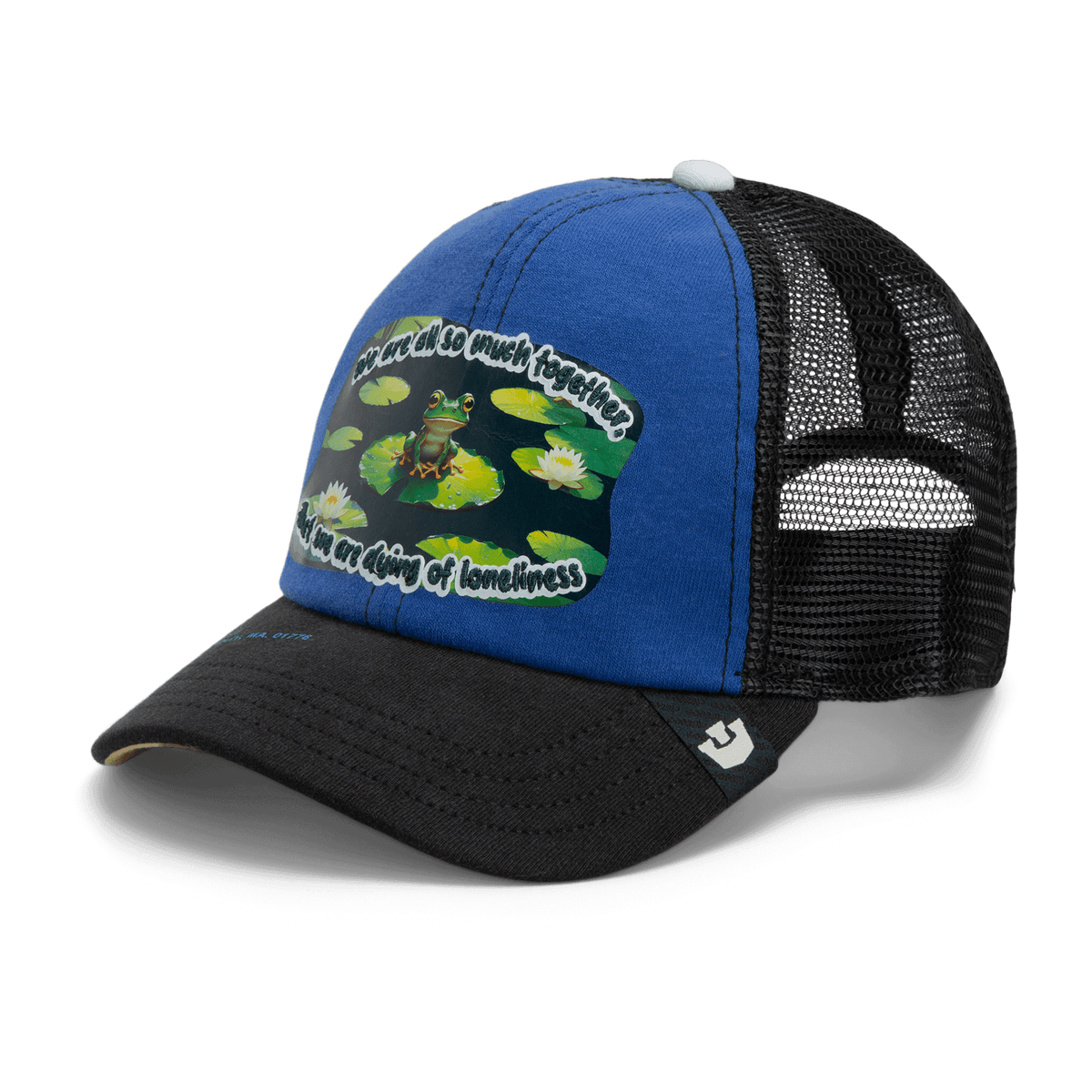 The Goorin Bros. Lil Sohei is a blue and black mesh trucker hat from the Storybook Collection featuring a frog on lily pads with the quote, "We were all so much together, but we were dying of loneliness.