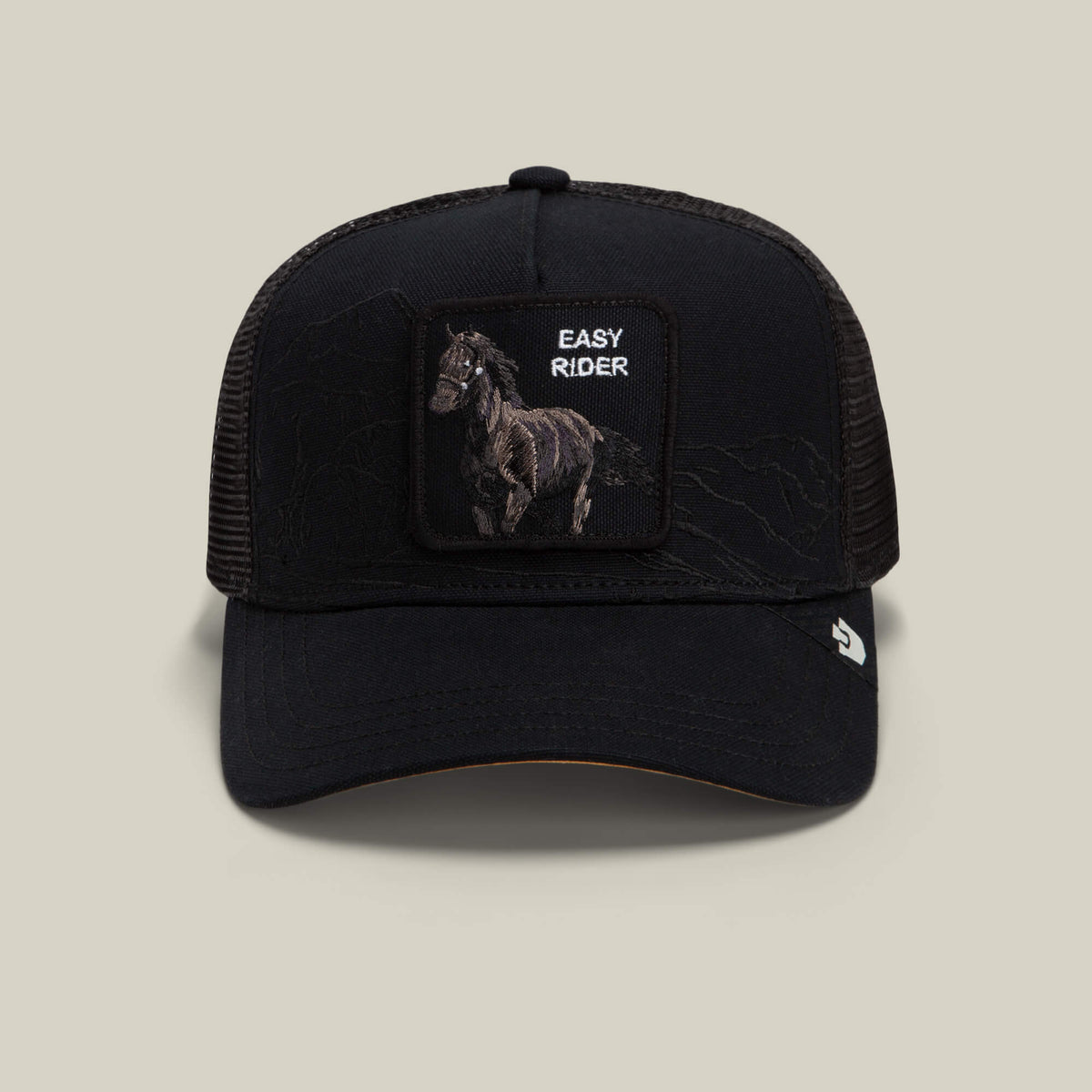 The Badlands Stallion by Goorin Bros. is a black mesh trucker hat featuring a front patch with an embroidered horse and the words EASY RIDER, a curved brim, and a small Goorin Bros. logo tag on the side.