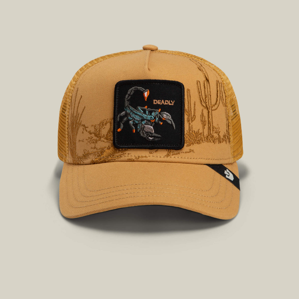 Amber trucker hat with mesh back, featuring a cactus design and a front patch labeled "DEADLY" with a scorpion, from the Goorin Bros. Badlands Scorpion collection.