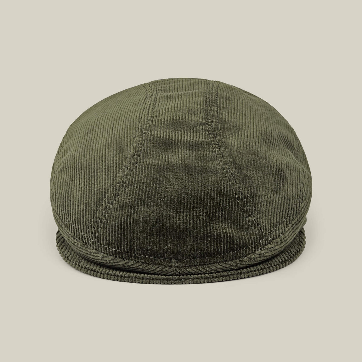 The Goorin Bros. Maxwell Park flatcap in olive green is shown against a plain, light beige background.