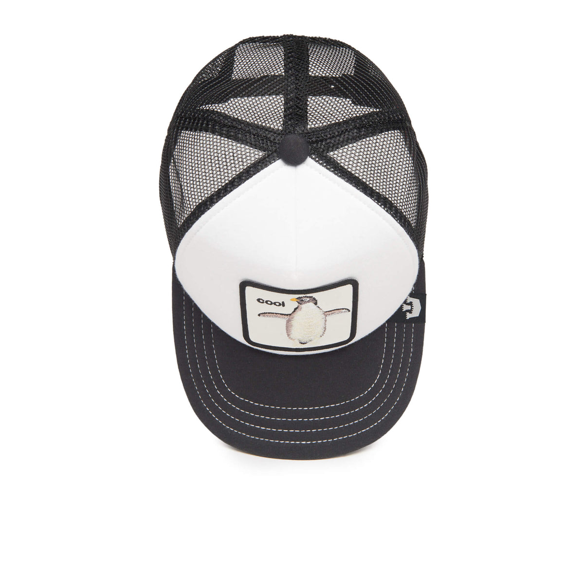 The Farm “Tuxie” is a children’s-sized black and white mesh trucker hat featuring a penguin patch with the word “cool” on the front. This adjustable hat, shown from above, is perfect for kid-sized truckers.