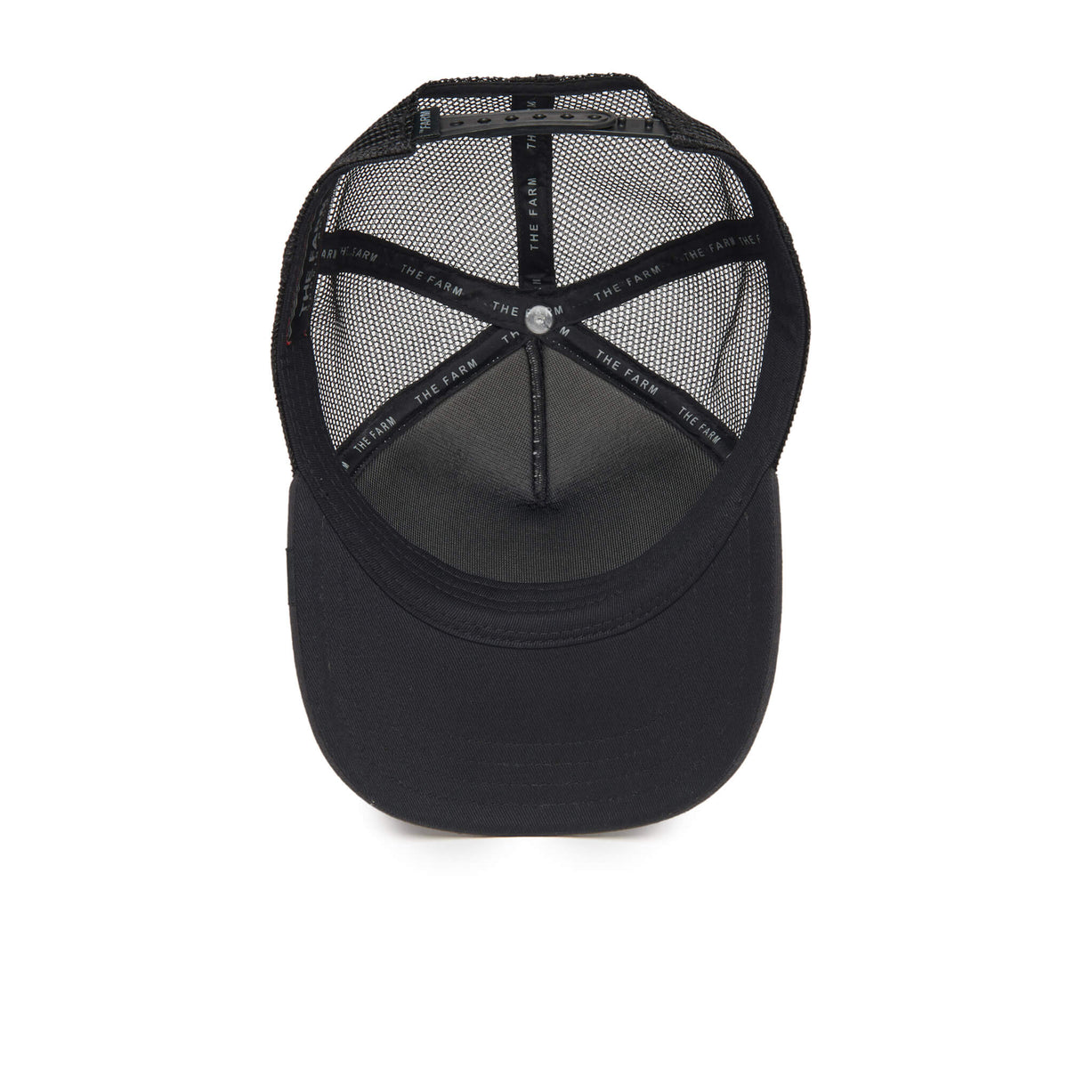 The Tuxie by The Farm is a black mesh trucker hat viewed from above, highlighting the interior with black hatbands and visible stitching; this adjustable hat ensures a comfortable fit and is ideal for those looking for a children’s sized option.