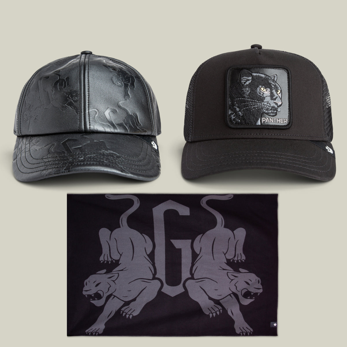 The Elite Panther Bundle from Goorin Bros. includes two black caps featuring panther designs and a black bandana adorned with two stylized panther illustrations and a prominent letter G in the center.