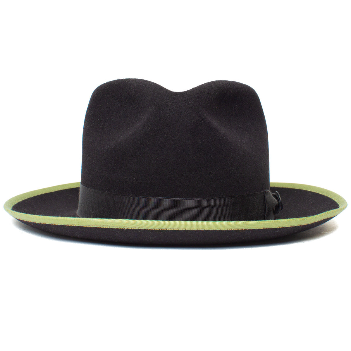 River Gray by Goorin Bros. is a wide brim fedora hat featuring an eye-catching green brim, black ribbon band, and indented crown, expertly crafted from premium merino wool. Photographed against a white background, this American made fedora blends timeless style with exceptional quality.