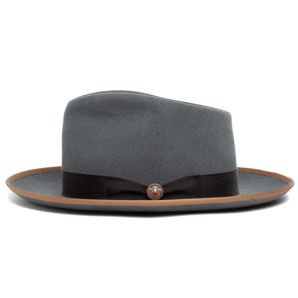 River Gray by Goorin Bros. is an elegant American-made merino wool fedora, featuring a wide brown-trimmed brim, black ribbon band, and a small round metal pin on the front—perfect for any occasion.
