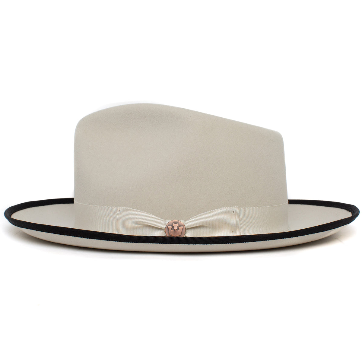 The River Gray by Goorin Bros. is a cream-colored wide brim fedora featuring a black-trimmed brim, matching ribbon band, and a decorative pin on the front.