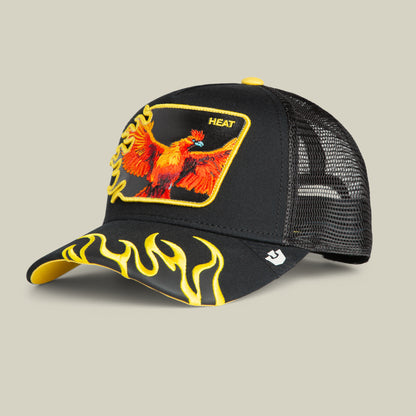 The Goorin Bros. Heat Flames cap features black mesh, striking yellow flames on the brim, and a bold red phoenix patch labeled “HEAT” on the front—an eye-catching trucker hat that makes a statement wherever you go.