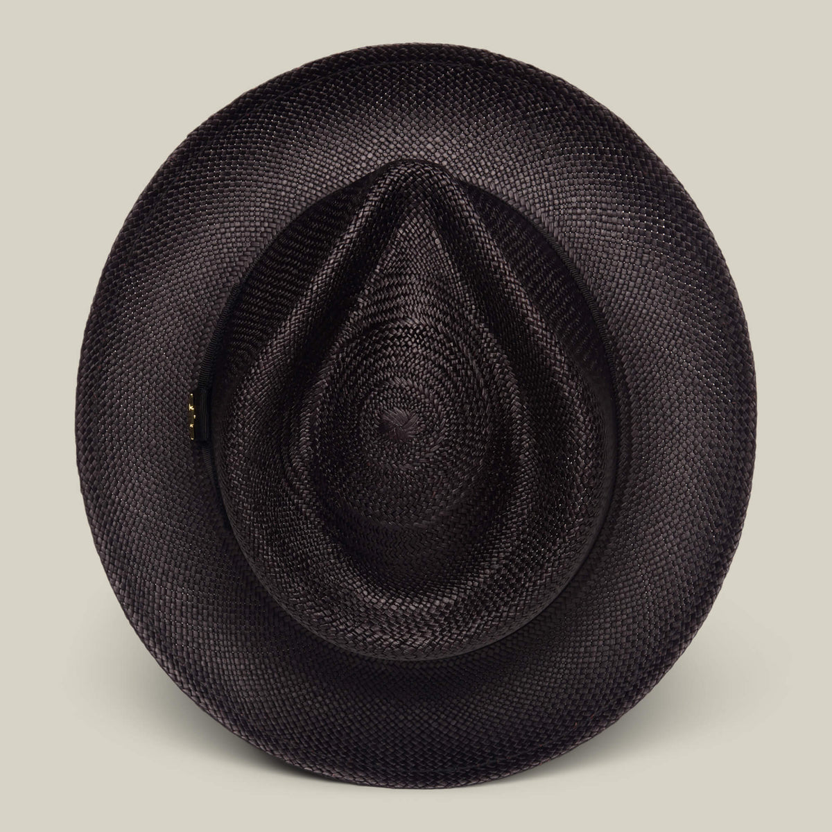 The John Sr. by Goorin Bros. is a black toquilla straw teardrop fedora with a wide brim, pointed crown, and 50 UPF sun protection, shown on a plain beige background.