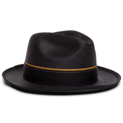 The Hartman by Goorin Bros. is a black fedora hat with a wide brim and a grosgrain band featuring a thin gold stripe, shown on a plain white background.
