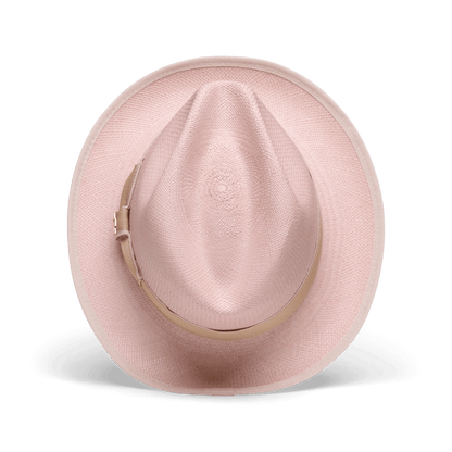 The Hartman by Goorin Bros. is a light pink straw fedora made from 100% toquilla, featuring a beige grosgrain hat band, shown from above on a plain white background.