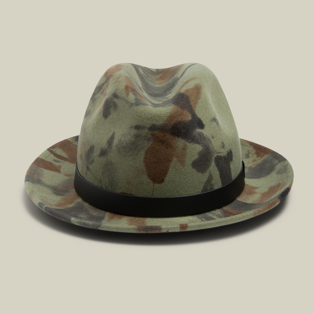 The Goorin Bros. "Dean the Butcher" fedora in camouflage is American-made, features a black grosgrain hatband, and is displayed against a plain beige background.