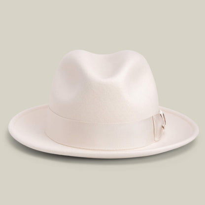 Dean the Butcher by Goorin Bros. is an American-made fedora in DUST, featuring a wide brim and matching grosgrain hatband, shown on a neutral background.