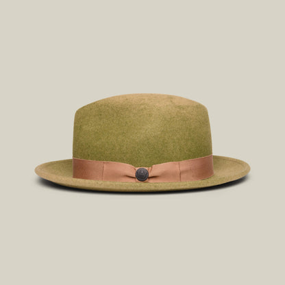 Dean the Butcher by Goorin Bros. is an olive green felt all-season wide-brim hat with a light brown ribbon band and decorative front button, displayed on a plain off-white background.