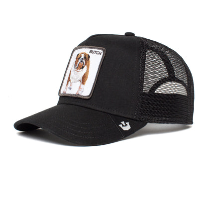 The Farm's "The Butch" is a black mesh trucker hat with a front patch showing an embroidered dog and "BUTCH." All sales are final.