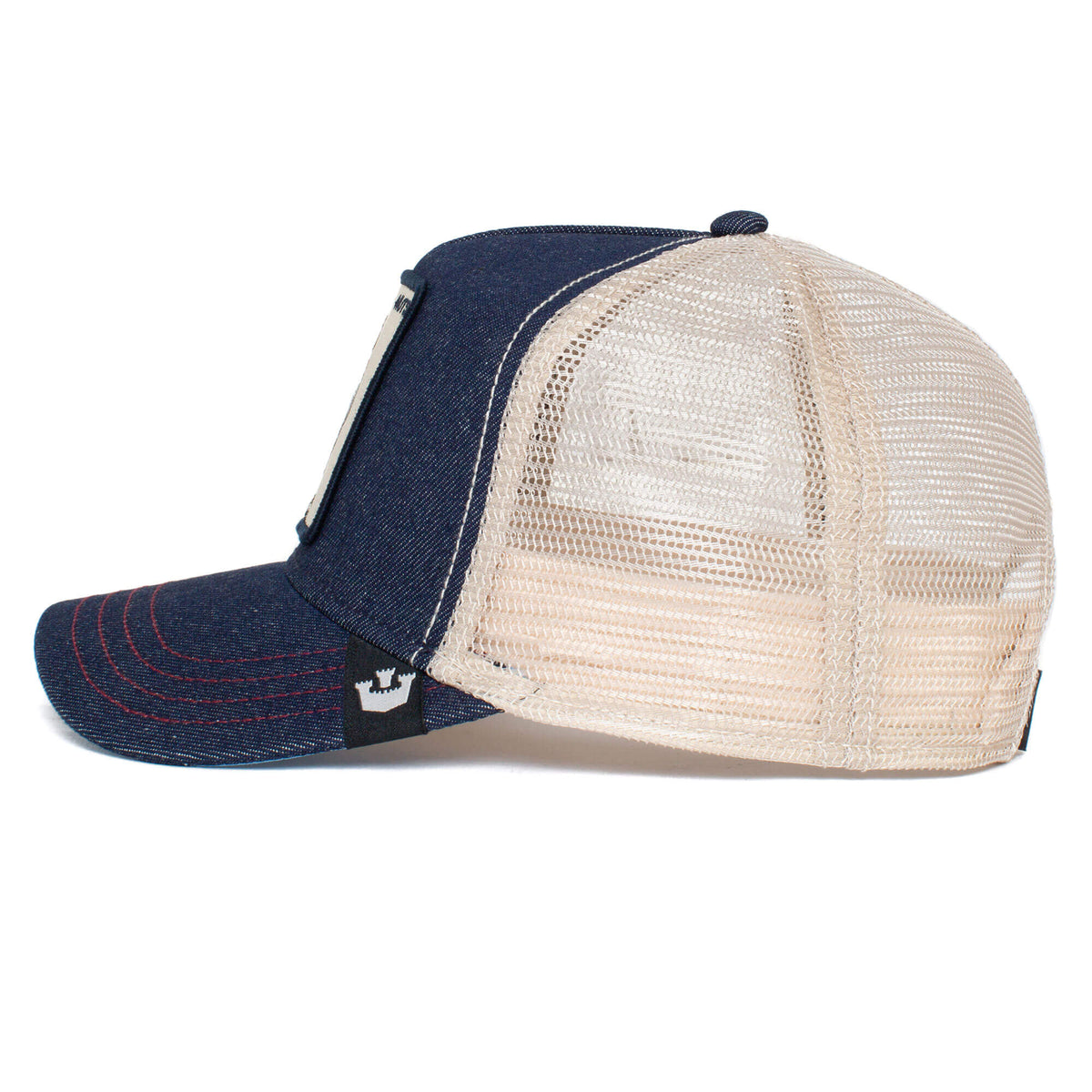 A side view of The Farm’s “The Nuts Squirrel” trucker hat—featuring blue and beige colors with a mesh back—set against a white background, perfect for showing off on your next adventure. Please note, all sales are final.