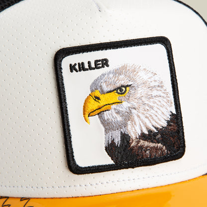 Close-up of The Farm’s Concrete Killer hat, featuring a patch with an embroidered bald eagle and "KILLER" above the image. All sales final.