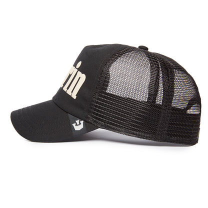 Black mesh trucker hat by Goorin Bros. called the “Soft Pack,” featuring a curved bill, front panel with partial white lettering, and a small tag with a maple leaf logo near the brim—a mildly remarkable accessory for any collection. All sales are final.