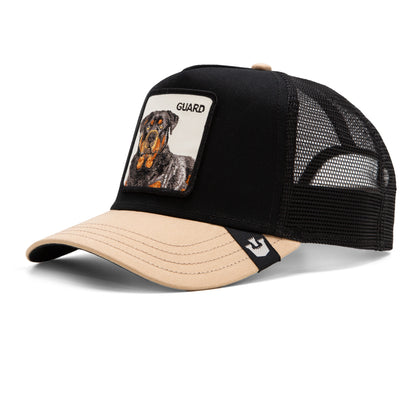 The Farm’s “The Guard Dog” trucker hat pairs black and beige panels with a mesh back and showcases a front patch of a loyal dog labeled “Guard”—a protective cap with serious presence.