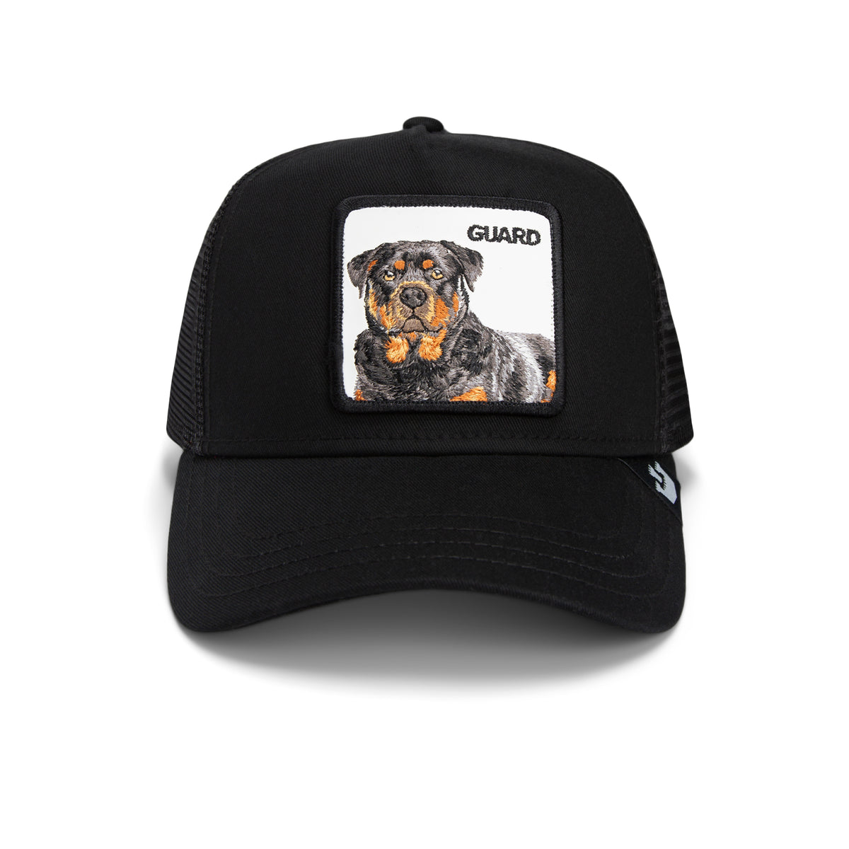 The Farm’s “The Guard Dog” is a black trucker hat featuring a front patch with an embroidered Rottweiler—symbolizing loyalty and strength—and the word “GUARD” in the top right corner.
