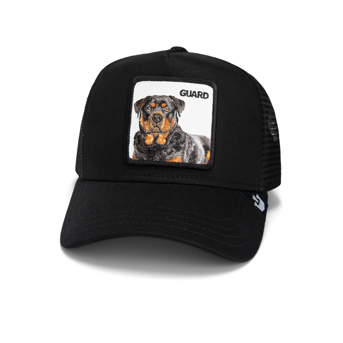 The Farm’s The Guard Dog is a black mesh baseball cap showcasing a patch with a loyal Rottweiler illustration and the word “GUARD” above the image; this protective hat exudes a commanding presence and is photographed against a white background.