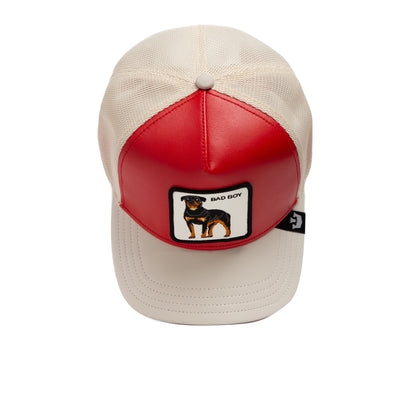 The Shleather Boy by The Farm is a red and cream trucker hat featuring a front patch with a dog and the text “BAD BOY”—a bold accessory that adds tough style to any outfit, perfect for channeling your inner leather woofer.