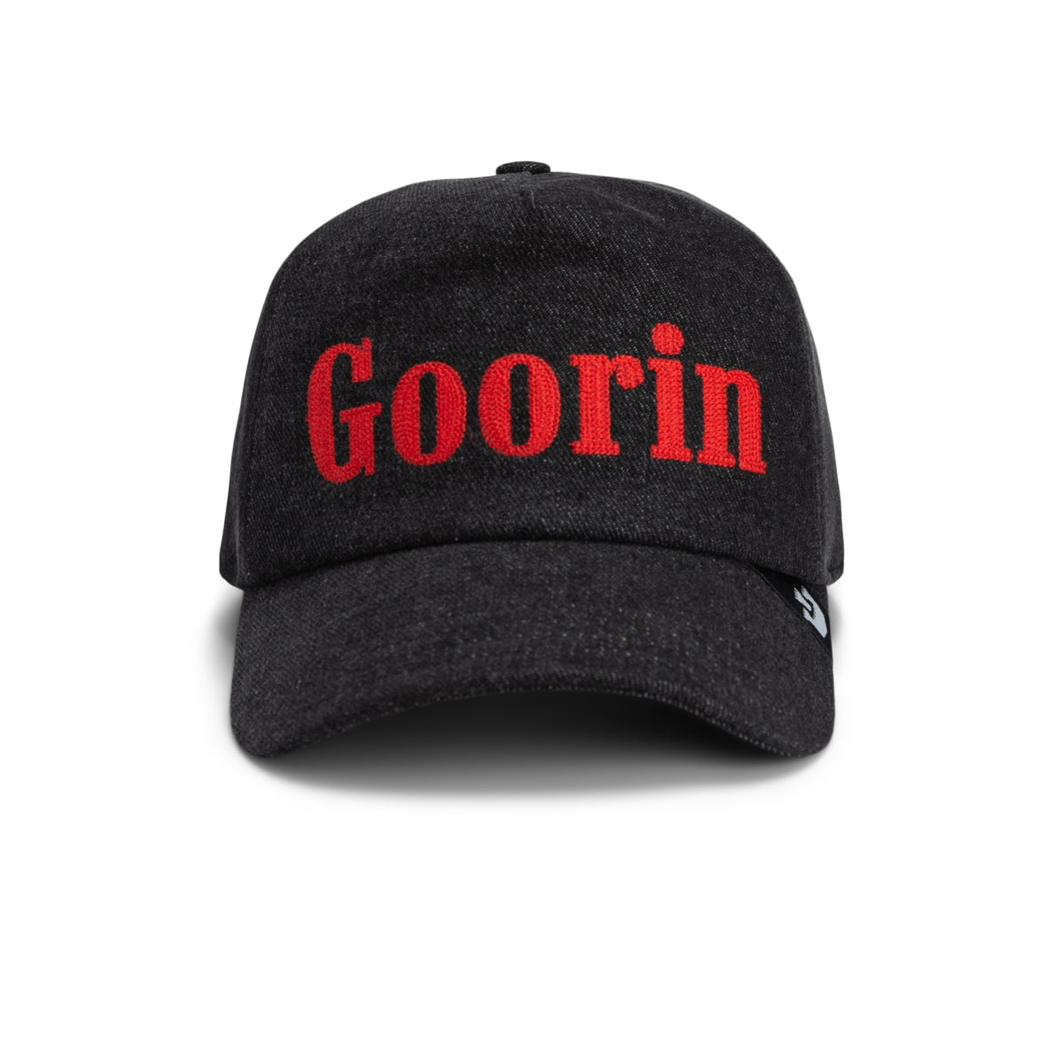 A front-view image of the Smoke Signal baseball cap by Goorin Bros., featuring the word “Goorin” embroidered in bold red letters on the front, crafted from premium black stonewashed denim.