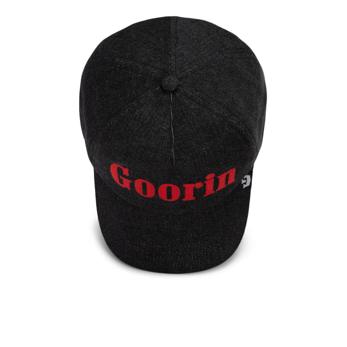 A black denim cap from Goorin Bros., named Smoke Signal, featuring red “Goorin” embroidery on the front, showcased from above on a white background.