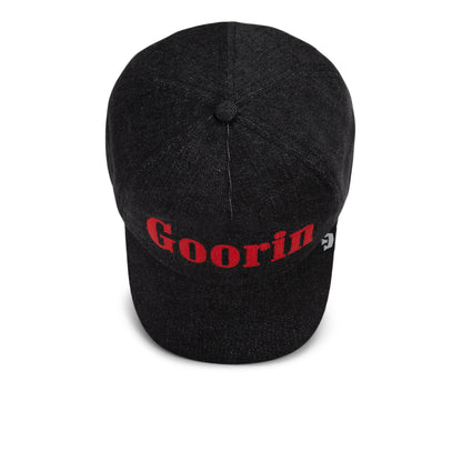 A black denim cap from Goorin Bros., named Smoke Signal, featuring red “Goorin” embroidery on the front, showcased from above on a white background.