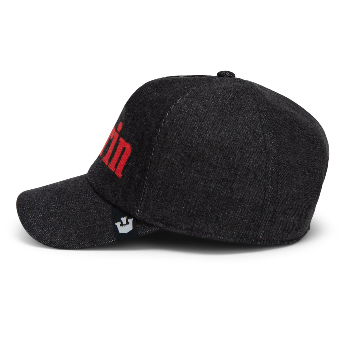 The Smoke Signal baseball cap by Goorin Bros. features dark gray stonewashed denim with red lettering partially visible on the front, viewed from the left side. A small black and white Goorin label is attached near the brim.