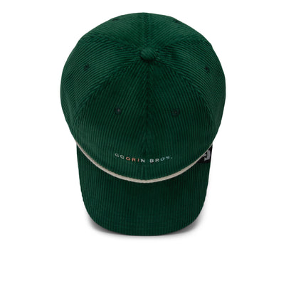 A green wide wale corduroy baseball cap from Goorin Bros., The Clubhouse features a white rope detail above the brim and “Goorin Bros.” text on the front, embodying quiet luxury and photographed against a white background.
