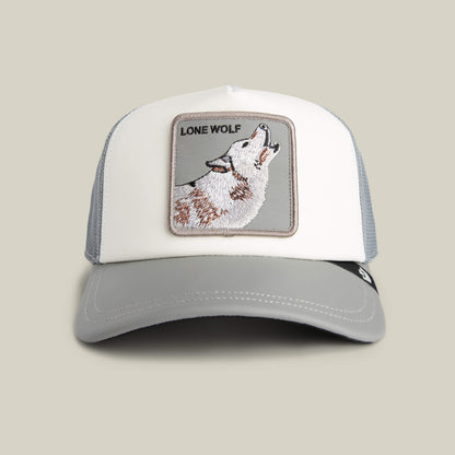 The Goorin Bros. LFG Lone Wolf trucker hat in DUST / GLOSS features a tunnel fit and a front patch with a howling wolf and "LONE WOLF" text.