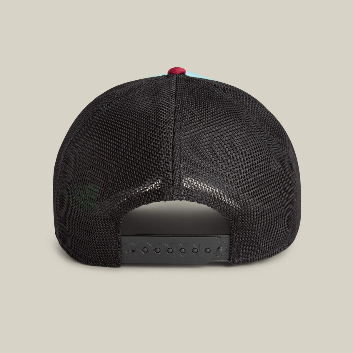 Back view of the Goorin Bros. Means Understood black mesh trucker hat with adjustable snapback closure, set against a plain light background—a confident choice for any occasion.