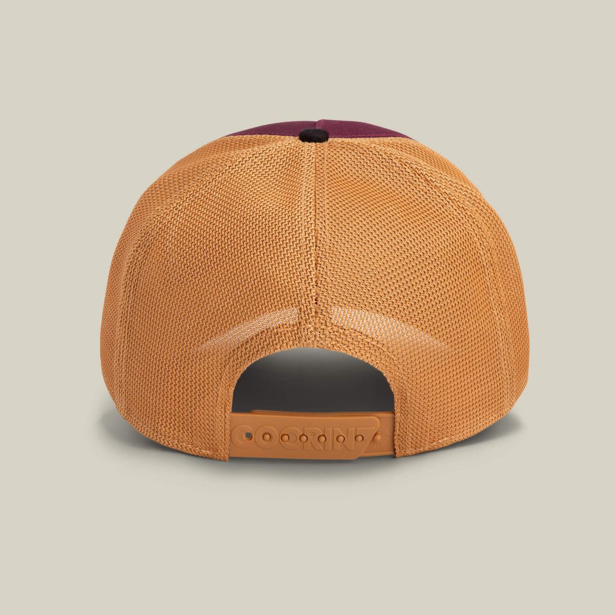 The image shows the back view of the Goorin Bros. Tricolor Owl mesh cap with an orange design and adjustable snapback closure, set against a plain light background.