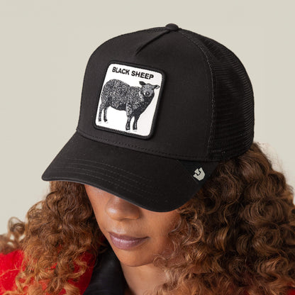 Show your bold side with the Goorin Bros. Black Sheep Trucker, featuring a mesh back and a patch with a black sheep and "BLACK SHEEP" on the front—ideal for risk-takers who embrace being different.