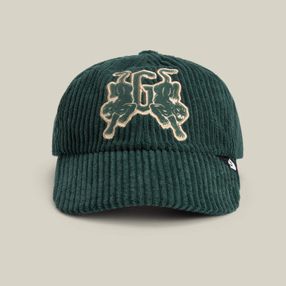 A dark green corduroy Bleacher Report baseball cap from Goorin Bros., featuring an embroidered G and two mirrored panther designs on the front—a true Papa Cap essential.