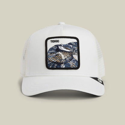 The Goorin Bros. Toxic Trucker is a dust-colored mesh hat featuring a patch with an embroidered snake and the word "TOXIC" above it.