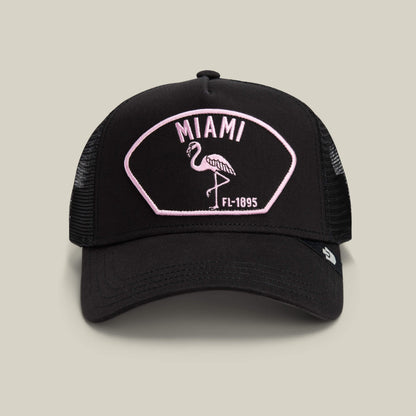 Show off your South Beach style with the VOID-colored "Miami" mesh cap by Goorin Bros., featuring a pink and white patch with a flamingo and FL-1895 text on the front.