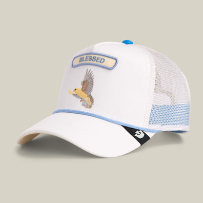 The Pop Rocker Blessed by Goorin Bros. is a white and light blue mesh back trucker hat featuring a BLESSED patch and an embroidered eagle, perfect for adding stylish flair to your look.