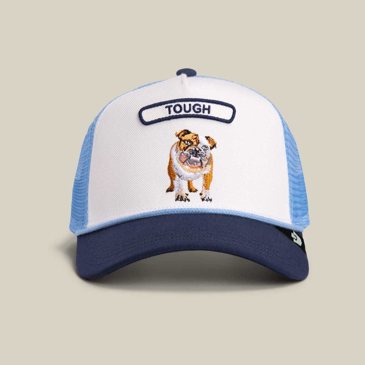 The Goorin Bros. Pop Rocker Bulldog hat in Dust / Galactic is a mesh trucker with a navy brim, featuring an embroidered bulldog and "TOUGH" on the front.