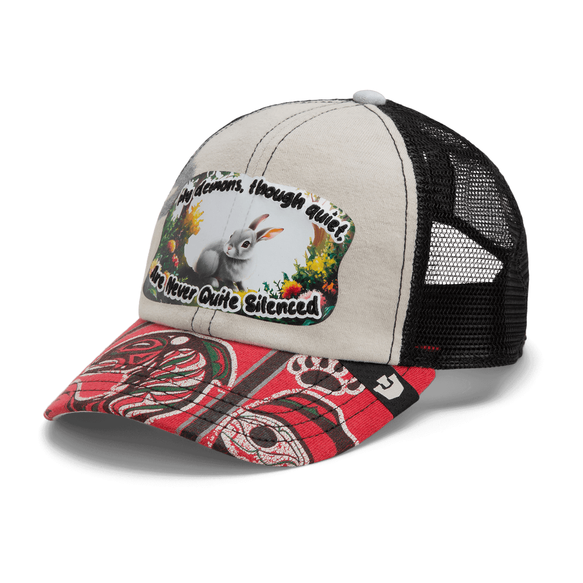 The Goorin Bros. Lil Ronin hat from our Storybook collection features a beige front, black mesh back, red patterned brim, and a rabbit patch that reads: “My demons, though quiet, are never quite silenced.”.