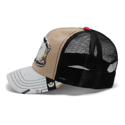 The Lil Ronin by Goorin Bros. is a beige and black trucker hat with a mesh back, gray graphic brim, and front patch—crafted from recycled tee shirts for an eco-friendly twist.