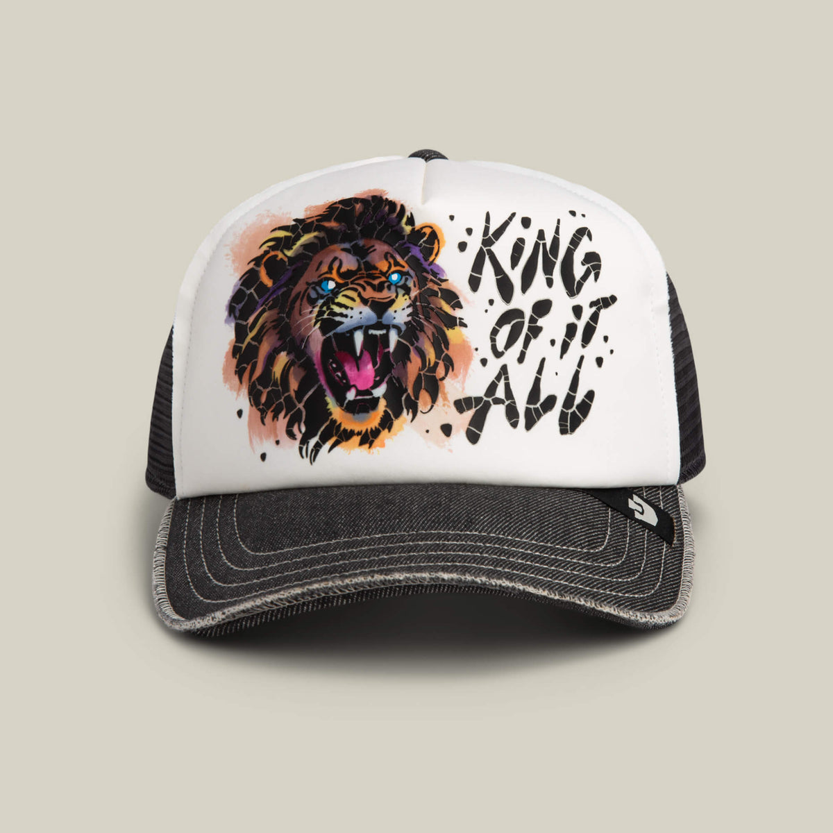 An oil gray King Disruption trucker hat by Goorin Bros., featuring an illustrated roaring lion and the bold text KING OF IT ALL on the front panel.